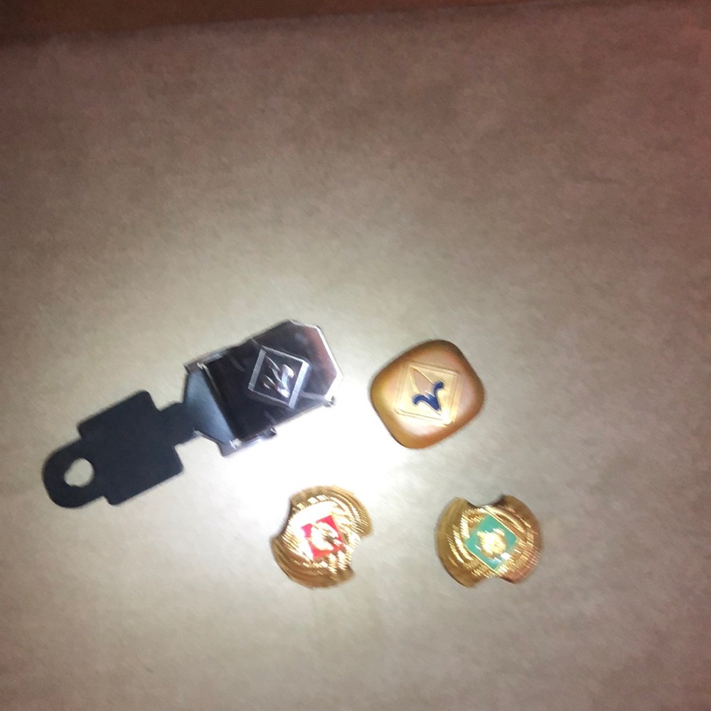 Cub Scout bandanna clips and one belt buckle